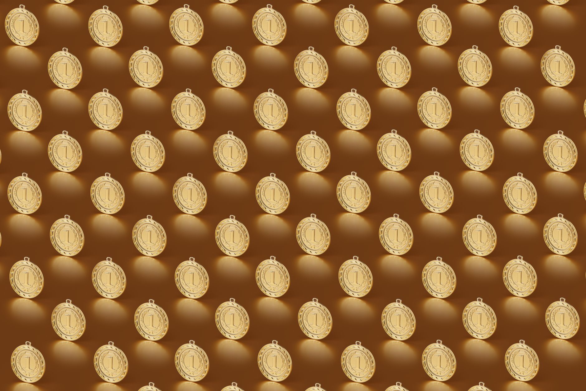 Multiple gold medals arranged in a repeating pattern on a brown backdrop.